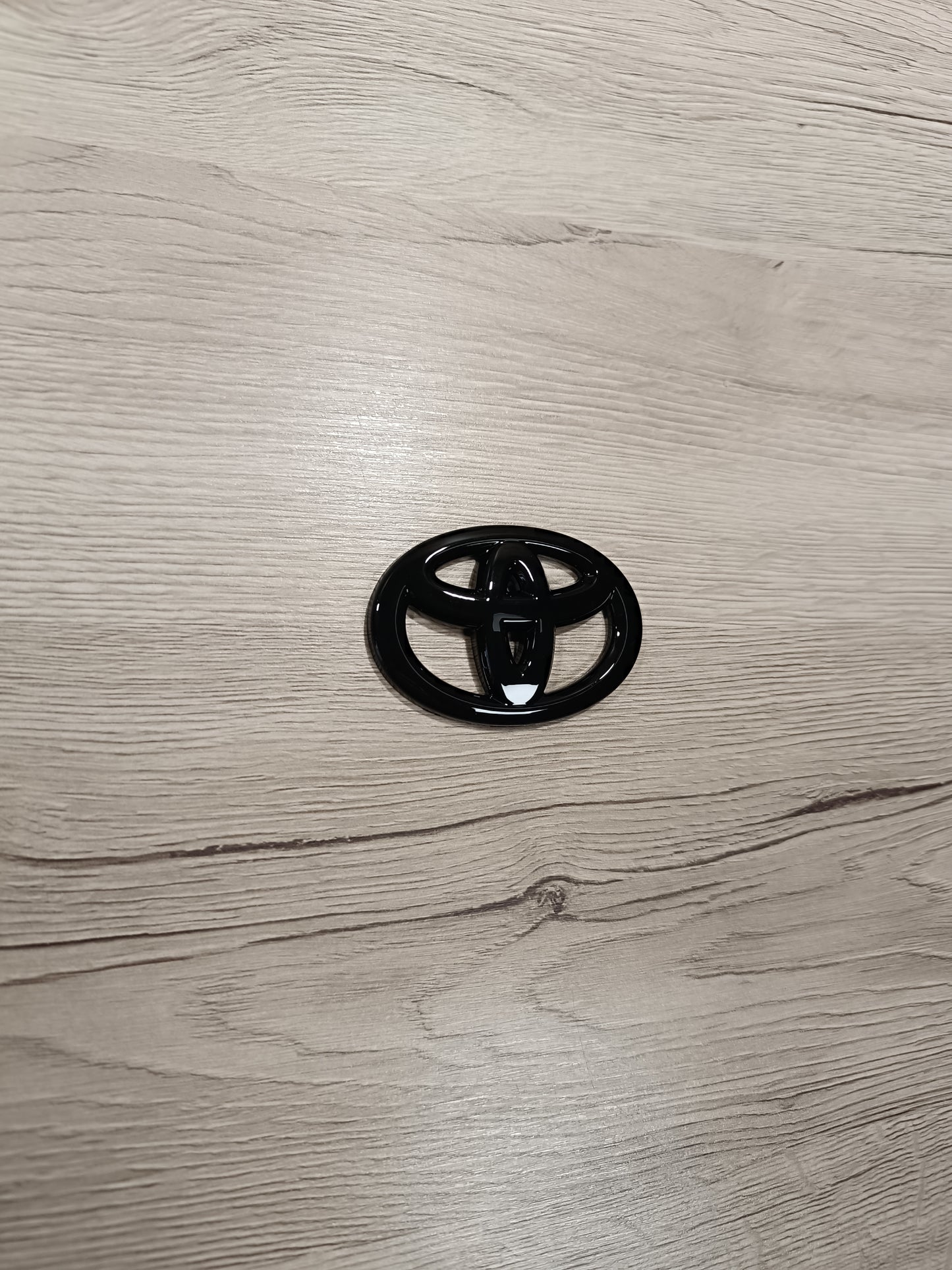 Toyota Lenkradlogo Emblem Schwarz
