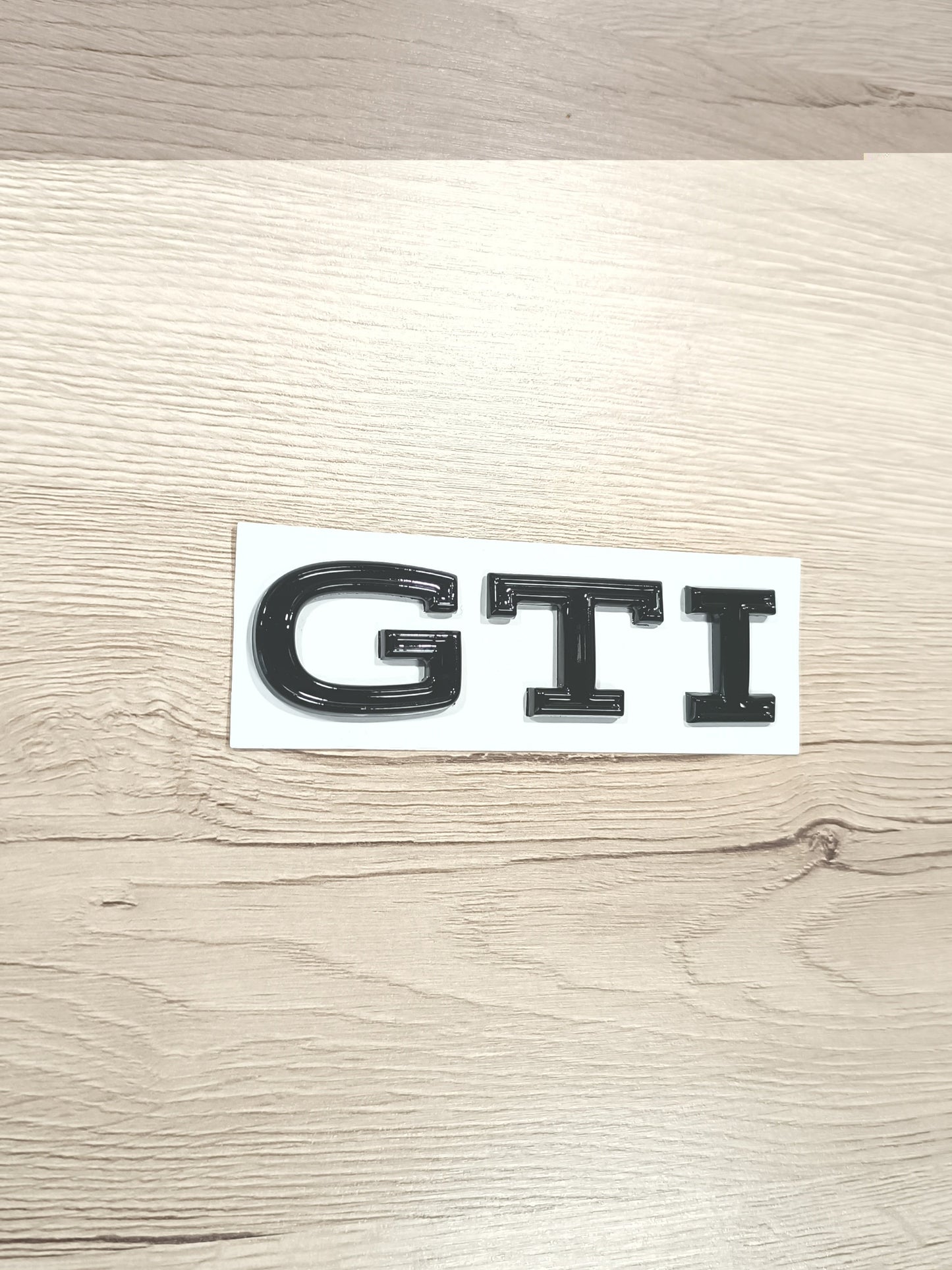 GTI Schriftzug Schwarz glänzend